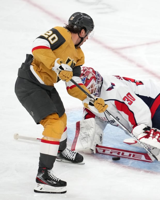 Apr 20, 2022; Las Vegas, Nevada, USA; Washington Capitals goaltender Ilya Samsonov (30) makes a save against Vegas Golden Knights center Chandler Stephenson (20) during the third period at T-Mobile Arena. Mandatory Credit: Stephen R. Sylvanie-USA TODAY Sports